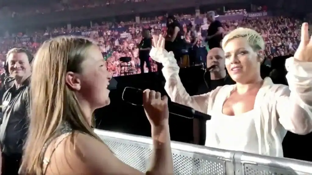 Pink stops concert and hands microphone to a 12-year-old girl, marvels at her voice when she starts to sing